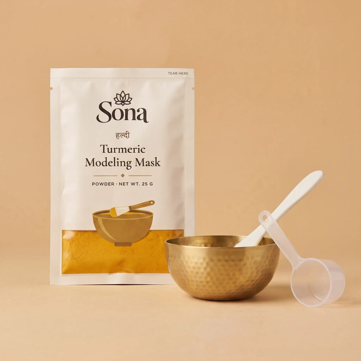 Sona Turmeric Modeling Mask sachet with brass bowl, spatula and measuring scoop